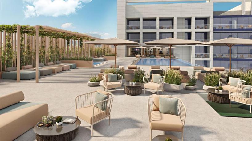 Imagen de la piscina del Aparthotel Bloom Arjaan by Rotana. Foto 7