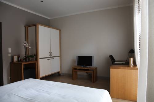 Imagen de la habitación del Aparthotel Boardhousing ApartService. Foto 3