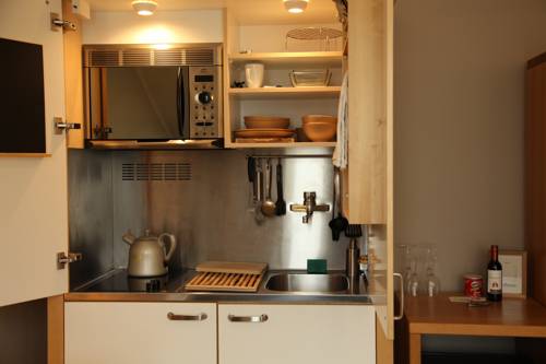 Imagen de la habitación del Aparthotel Boardhousing ApartService. Foto 4