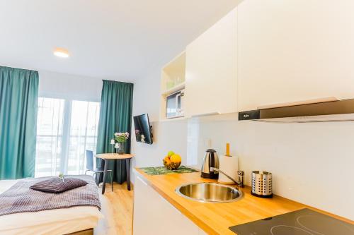 Imagen de la habitación del Aparthotel COIN Krakowska. Foto 13