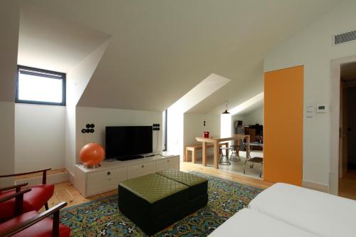 Imagen de la habitación del Aparthotel Cais Urban Lodge. Foto 13