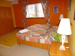 Imagen de la habitación del Aparthotel Calabash Apartments. Foto 7