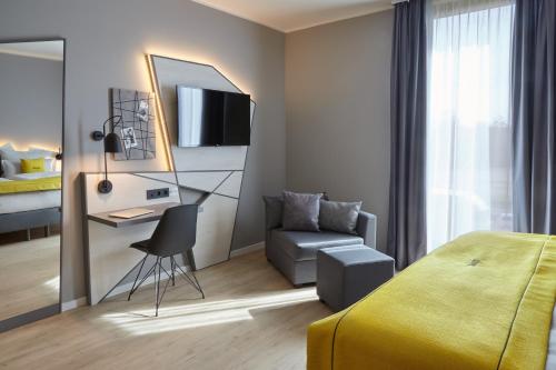 Imagen de la habitación del Aparthotel Candlewood Suites Dusseldorf Airport by IHG. Foto 19