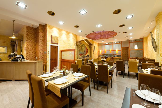 Imagen del bar/restaurante del Aparthotel Capitolina. Foto 4