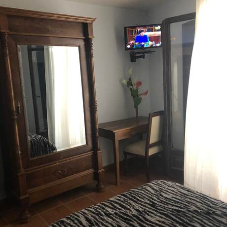 Imagen de la habitación del Aparthotel Casa Arnal. Foto 7