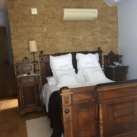 Imagen de la habitación del Aparthotel Casa Arnal. Foto 14