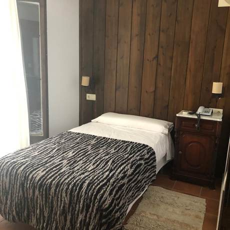 Imagen de la habitación del Aparthotel Casa Arnal. Foto 19