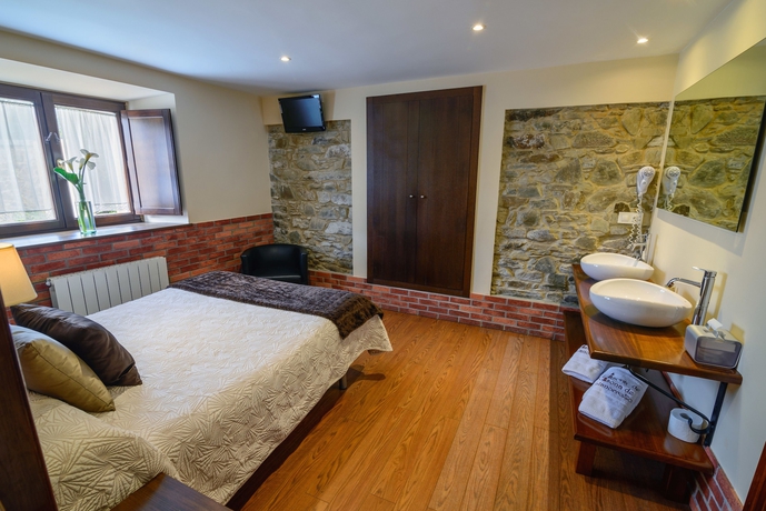 Imagen de la habitación del Aparthotel Casona De Llanorrozo. Foto 9