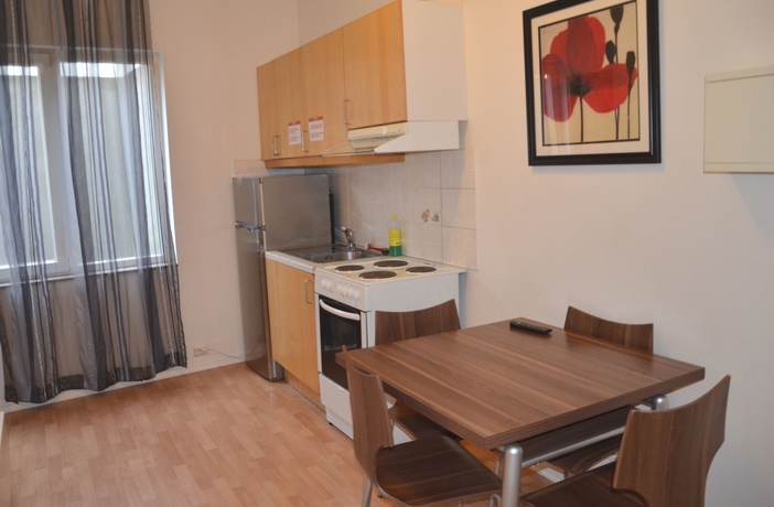 Imagen de la habitación del Aparthotel Central City Apartments. Foto 10