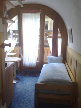 Imagen de la habitación del Aparthotel Chasa Val&auml;r. Foto 13