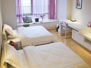 Imagen de la habitación del Aparthotel China Dragon, Guangzhou. Foto 6