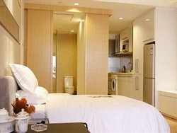 Imagen de la habitación del Aparthotel China Dragon, Guangzhou. Foto 7