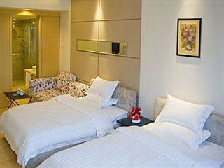 Imagen de la habitación del Aparthotel China Dragon, Guangzhou. Foto 11