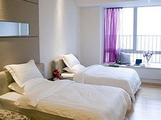 Imagen de la habitación del Aparthotel China Dragon, Guangzhou. Foto 12
