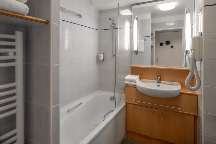 Imagen de la habitación del Aparthotel Citadines Bastille Marais Paris. Foto 11