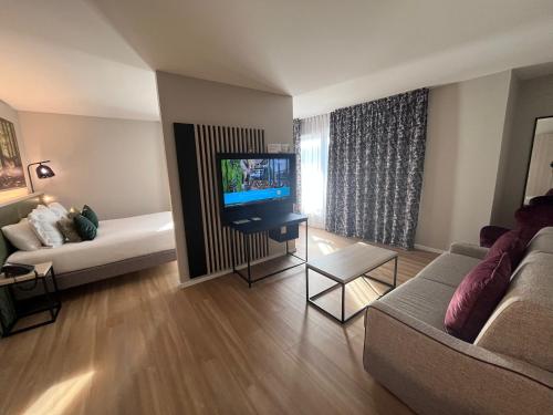 Imagen de la habitación del Aparthotel Citadines Eurometropole Strasbourg. Foto 12