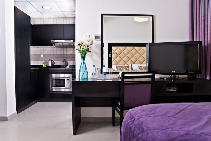 Imagen de la habitación del Aparthotel Citadines Metro Central Hotel Apartments Dubai. Foto 1