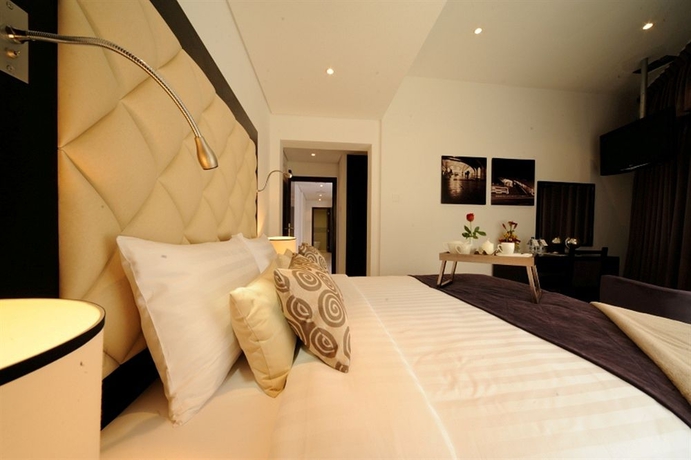 Imagen de la habitación del Aparthotel Citadines Metro Central Hotel Apartments Dubai. Foto 2