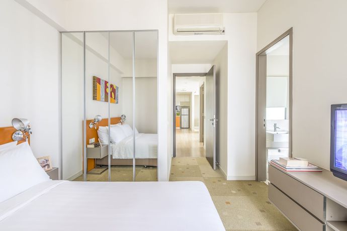 Imagen de la habitación del Aparthotel Citadines Mount Sophia Singapore. Foto 2