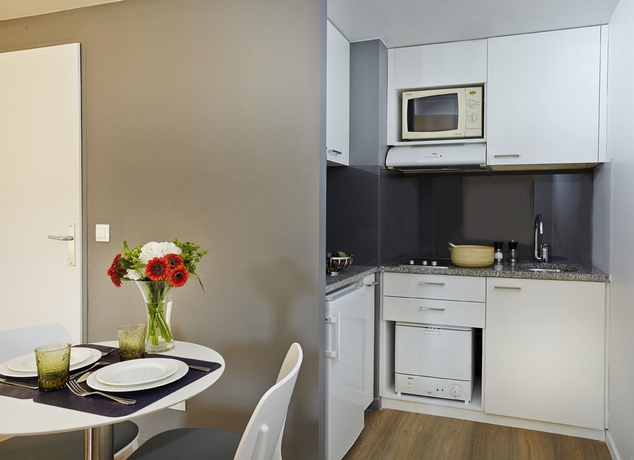 Imagen de la habitación del Aparthotel Citadines Presqu'&icirc;le Lyon. Foto 9