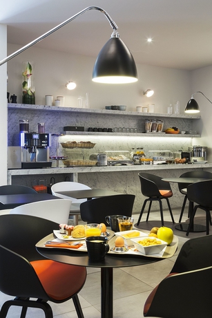 Imagen del bar/restaurante del Aparthotel Citadines Presqu'&icirc;le Lyon. Foto 3