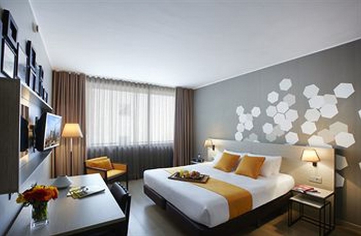 Imagen de la habitación del Aparthotel Citadines Ramblas Barcelona. Foto 11