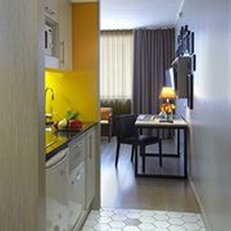 Imagen de la habitación del Aparthotel Citadines Ramblas Barcelona. Foto 12