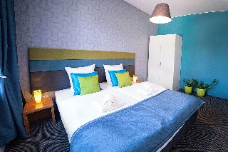 Imagen de la habitación del Aparthotel City Residence, Lodz. Foto 5