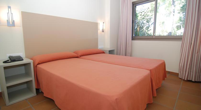 Imagen de la habitación del Aparthotel Ciutat De Palol. Foto 4