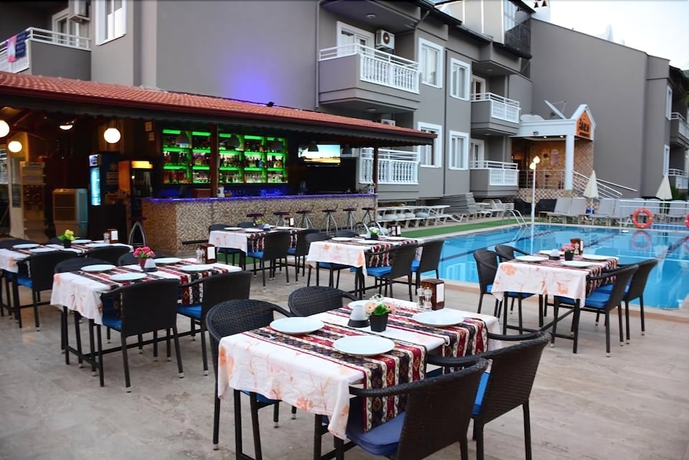 Imagen del bar/restaurante del Aparthotel Club Ako Apartments. Foto 4