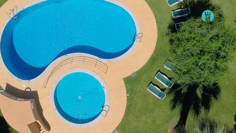 Imagen de la piscina del Aparthotel Clube Maria Luisa. Foto 19