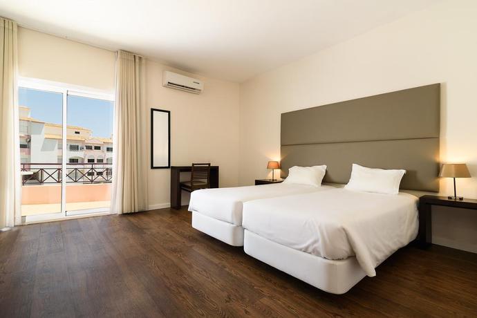 Imagen de la habitación del Aparthotel Clube Vilarosa. Foto 6