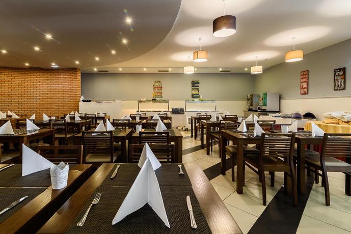 Imagen del bar/restaurante del Aparthotel Clube Vilarosa. Foto 2