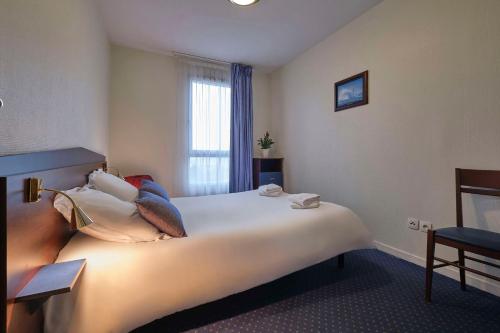 Imagen de la habitación del Aparthotel Comfort Carcassonne. Foto 3