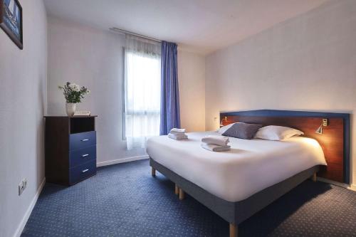 Imagen de la habitación del Aparthotel Comfort Carcassonne. Foto 6