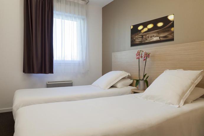 Imagen de la habitación del Aparthotel Comfort Les Hauts d'Annecy. Foto 7
