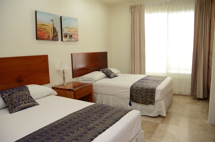 Imagen de la habitación del Aparthotel Coral Maya Stay Suites. Foto 4