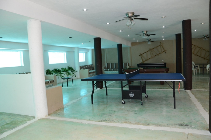 Imagen de los interiores del Aparthotel Coral Maya Stay Suites. Foto 13