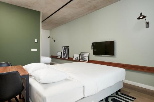 Imagen de la habitación del Aparthotel Corendon Apartments Amsterdam Schiphol Airport Hotel. Foto 6