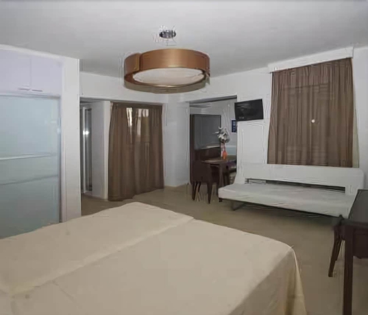 Imagen de la habitación del Aparthotel Cosmos Hotel. Foto 6