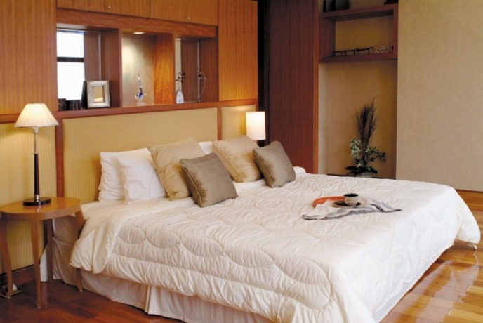 Imagen de la habitación del Aparthotel Dalian Asia Pacific Service Apartment. Foto 3