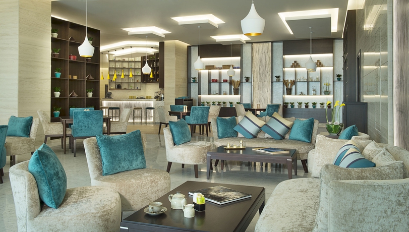 Imagen del bar/restaurante del Aparthotel Damac Maison De Ville Breeze. Foto 6