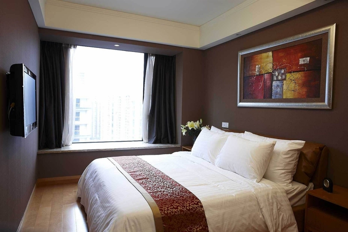 Imagen de la habitación del Aparthotel Dan Executive Apartment Guangzhou. Foto 2