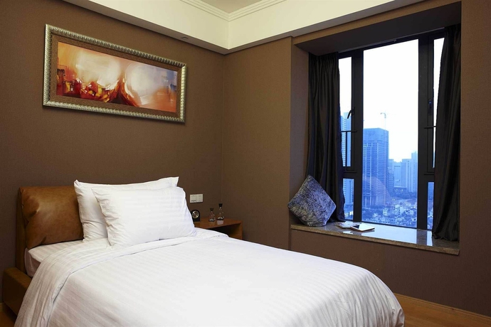 Imagen de la habitación del Aparthotel Dan Executive Apartment Guangzhou. Foto 7