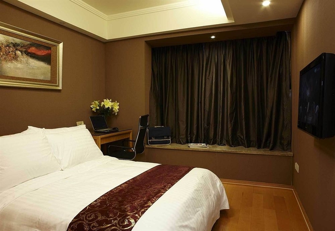 Imagen de la habitación del Aparthotel Dan Executive Apartment Guangzhou. Foto 10