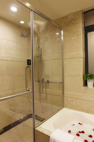 Imagen de la habitación del Aparthotel Dan Executive Apartment Guangzhou. Foto 11