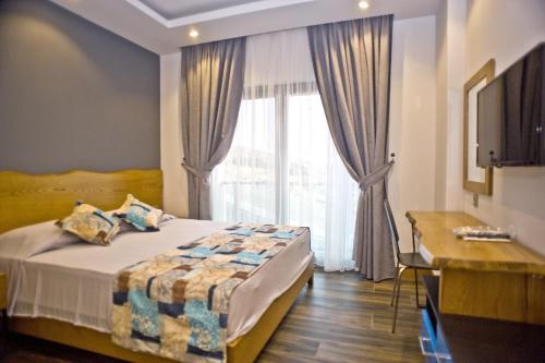 Imagen de la habitación del Aparthotel Degirmenburnu Residence. Foto 4