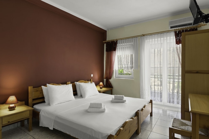 Imagen de la habitación del Aparthotel Delphin Rooms Sivota. Foto 11