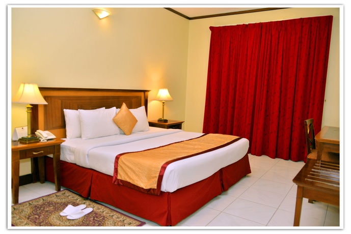 Imagen de la habitación del Aparthotel Desert Rose Hotel Apartments. Foto 8