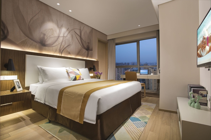 Imagen de la habitación del Aparthotel EVEN Hotel Zhongshan City Center. Foto 6